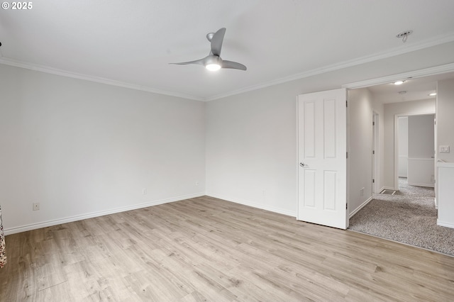 empty room featuring ornamental molding, ceiling fan, and light hardwood / wood-style flooring