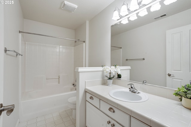 full bathroom featuring toilet, vanity, and shower / bathing tub combination