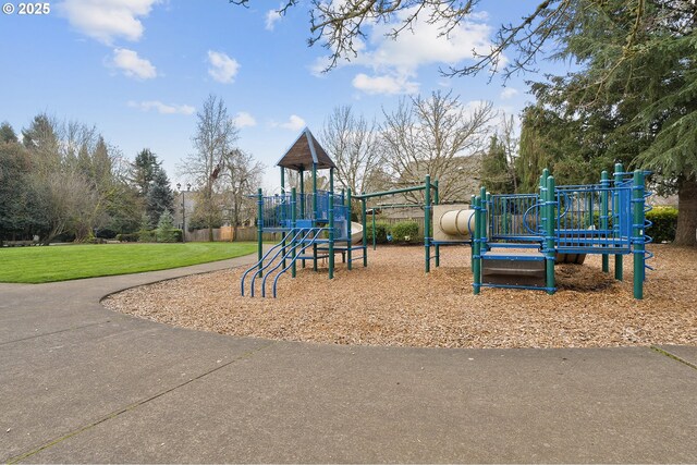 view of play area featuring a lawn