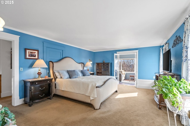 bedroom with light carpet and baseboards