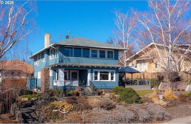 view of front of house with a chimney