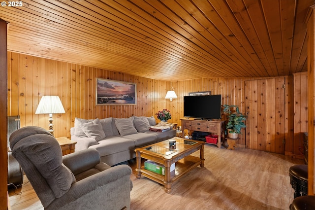 living area with wooden ceiling and wood finished floors