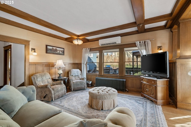 living room featuring light wood-style flooring, radiator heating unit, coffered ceiling, and a wall mounted air conditioner