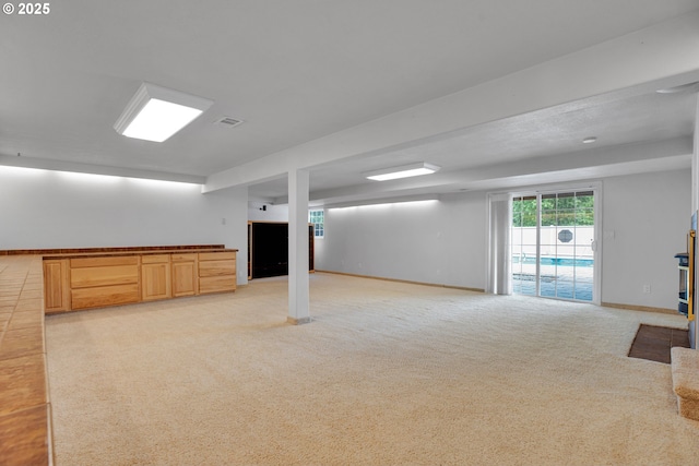 11675 SW Lynn St, Portland, OR 97223 - below grade area with light carpet and baseboards