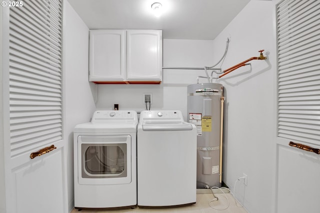 11675 SW Lynn St, Portland, OR 97223 - laundry area with cabinet space, secured water heater, and washing machine and clothes dryer