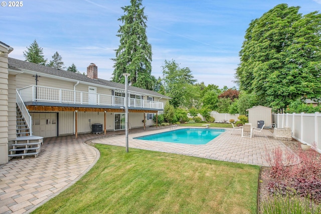 11675 SW Lynn St, Portland, OR 97223 - view of swimming pool featuring a patio, central AC unit, a diving board, and stairs