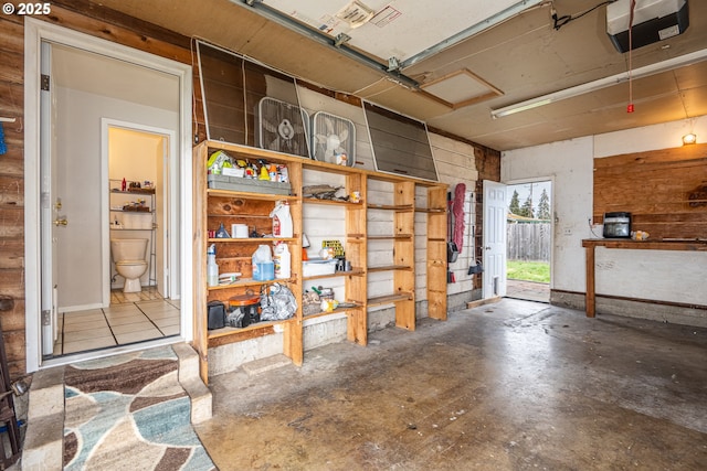 garage featuring a garage door opener