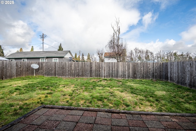 view of yard featuring a fenced backyard