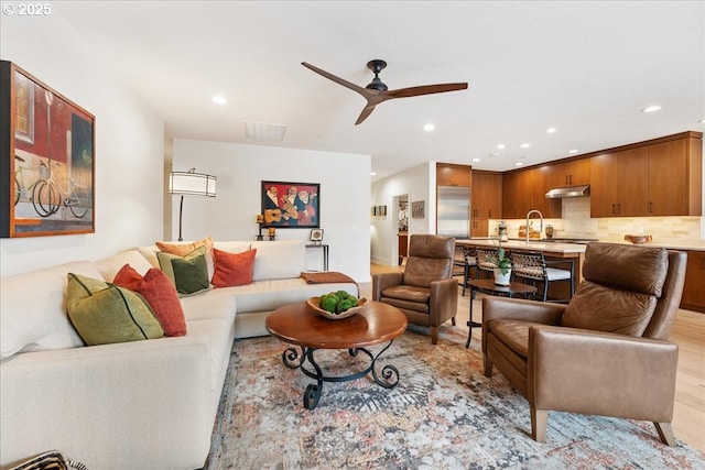 525 SE Marion St # 2, Portland, OR 97202 - living room with recessed lighting, a ceiling fan, and light wood-style flooring