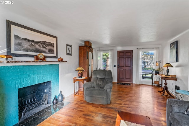1538 Grove St, Eugene, OR 97404 - living room featuring wood finished floors and a fireplace