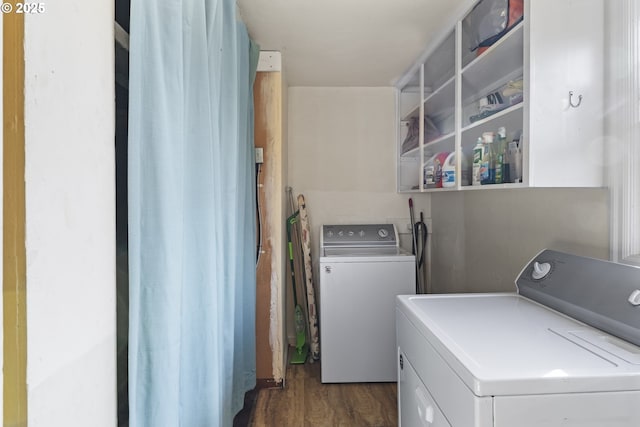 1538 Grove St, Eugene, OR 97404 - washroom with washer and dryer and dark wood-style floors