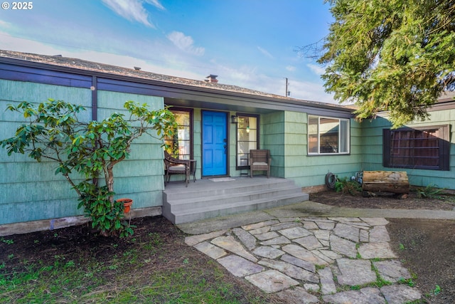 1538 Grove St, Eugene, OR 97404 - view of exterior entry featuring a porch