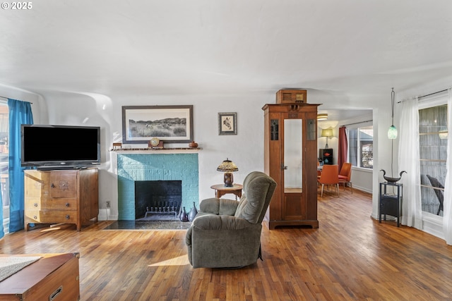 1538 Grove St, Eugene, OR 97404 - living area with wood finished floors and a fireplace with flush hearth