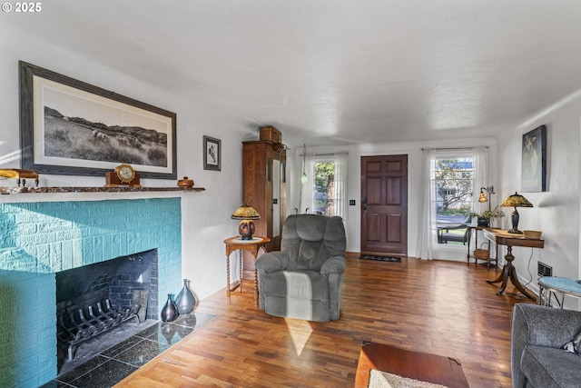 1538 Grove St, Eugene, OR 97404 - living room featuring wood finished floors and a fireplace