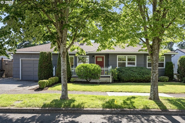 4770 SW Beech Dr, Beaverton, OR 97005 - view of front of home featuring a garage, a front yard, a shingled roof, and driveway