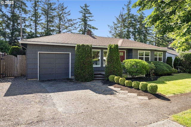 4770 SW Beech Dr, Beaverton, OR 97005 - ranch-style house featuring gravel driveway, an attached garage, a gate, a chimney, and roof with shingles