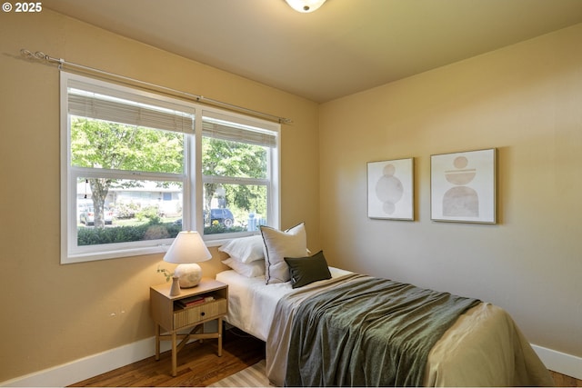 4770 SW Beech Dr, Beaverton, OR 97005 - bedroom featuring baseboards and wood finished floors