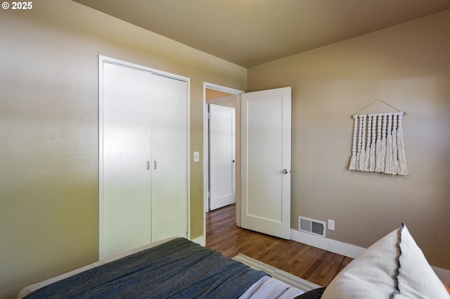 4770 SW Beech Dr, Beaverton, OR 97005 - bedroom featuring wood finished floors, baseboards, and a closet