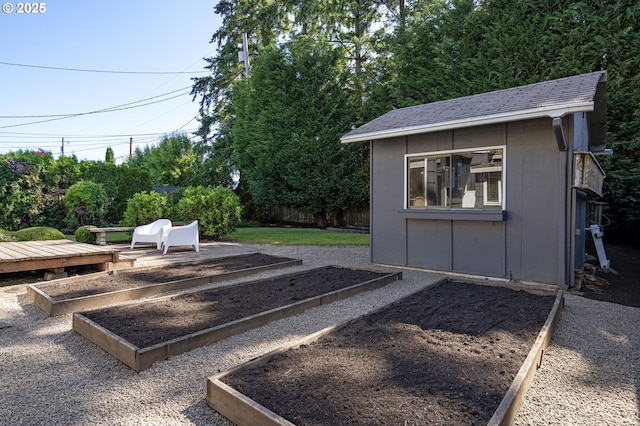 4770 SW Beech Dr, Beaverton, OR 97005 - view of yard with a vegetable garden and an outdoor structure