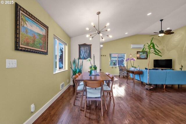 3275 Redwood Loop, Florence, OR 97439 - dining room with wood finished floors, a chandelier, lofted ceiling, baseboards, and a wall mounted air conditioner