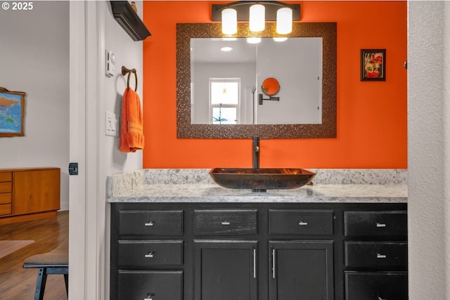 3275 Redwood Loop, Florence, OR 97439 - bathroom with vanity and wood finished floors