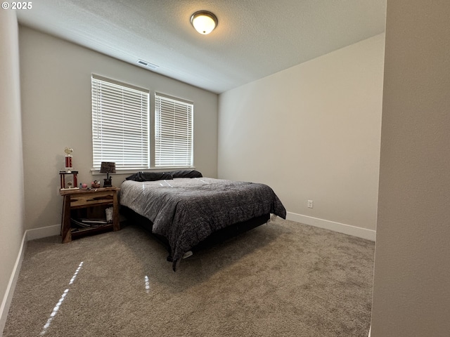 987 Farmington Dr, Junction City, OR 97448 - carpeted bedroom featuring baseboards and a textured ceiling