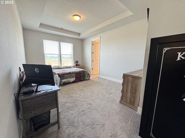 987 Farmington Dr, Junction City, OR 97448 - bedroom featuring carpet flooring, a raised ceiling, baseboards, and a textured ceiling