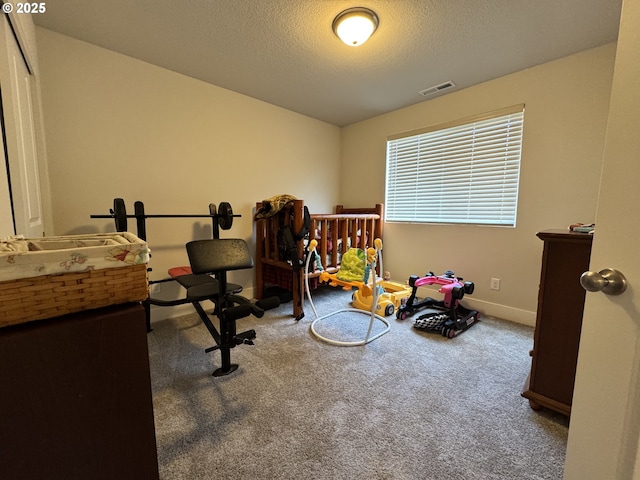 987 Farmington Dr, Junction City, OR 97448 - carpeted bedroom featuring a textured ceiling and baseboards