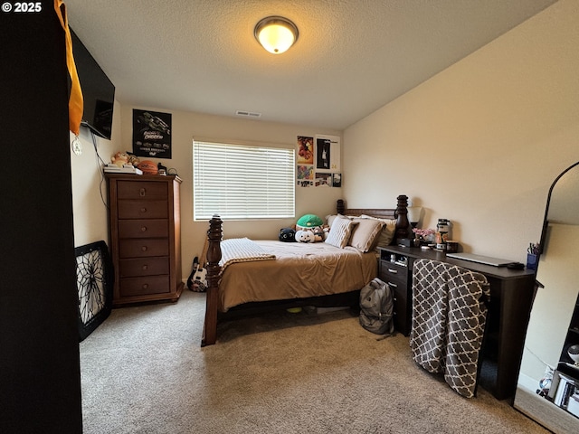 987 Farmington Dr, Junction City, OR 97448 - carpeted bedroom featuring a textured ceiling