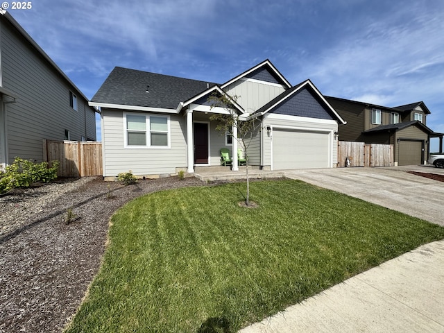987 Farmington Dr, Junction City, OR 97448 - view of front of home with an attached garage, driveway, and board and batten siding