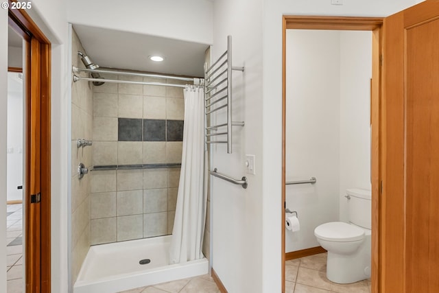 88369 Timberline Dr, Veneta, OR 97487 - full bathroom with a stall shower, toilet, recessed lighting, and tile patterned floors