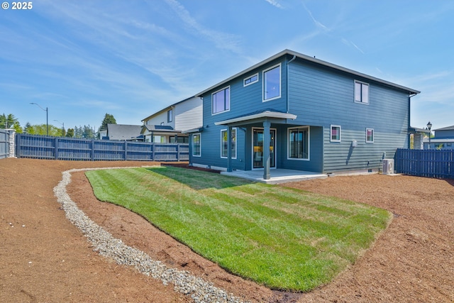 4308 N 12th Way, Ridgefield, WA 98642 - rear view of house with a patio area and a fenced backyard