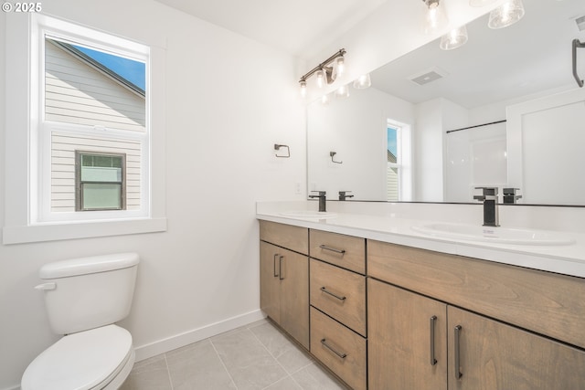 4308 N 12th Way, Ridgefield, WA 98642 - full bath with double vanity, plenty of natural light, and tile patterned floors