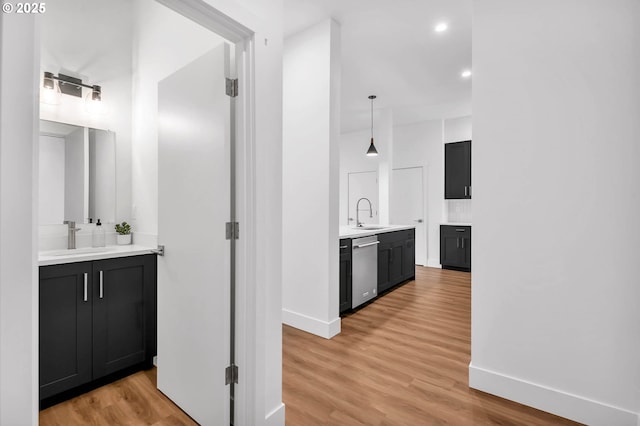 bathroom featuring vanity and wood-type flooring