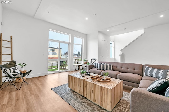 living room with light hardwood / wood-style floors