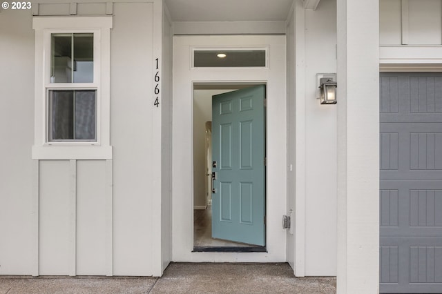 property entrance with board and batten siding