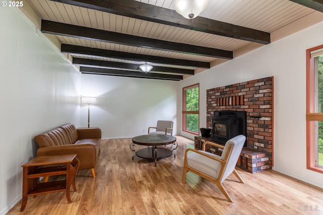 27539 Kingsley Rd, Scappoose, OR 97056 - sitting room with wood finished floors, baseboards, and wood ceiling with exposed beams