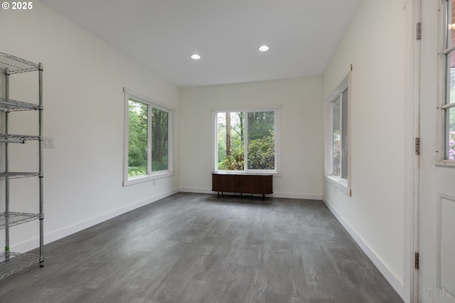 27539 Kingsley Rd, Scappoose, OR 97056 - spare room featuring dark wood-style flooring, baseboards, and recessed lighting