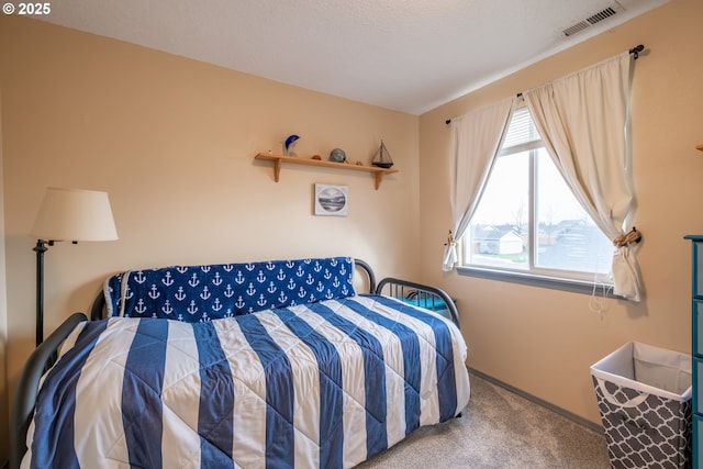 bedroom featuring carpet flooring