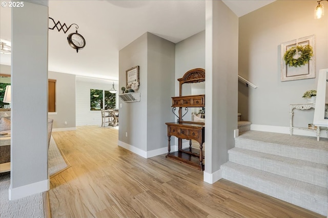 entryway with light hardwood / wood-style flooring