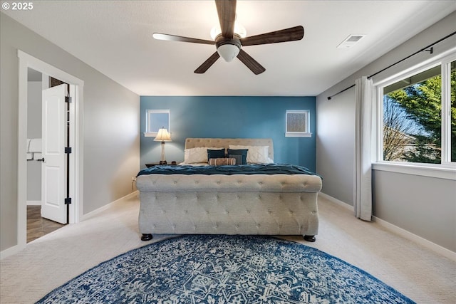 bedroom with ceiling fan and carpet flooring