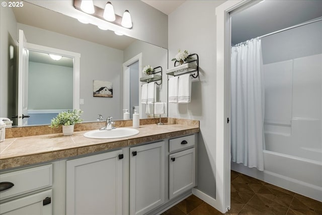 bathroom featuring vanity, shower / tub combo, and tile patterned flooring