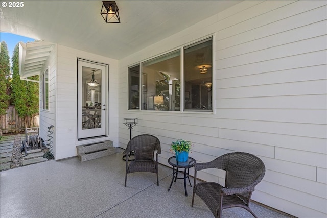 property entrance with a patio