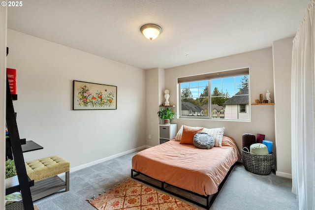 carpeted bedroom with baseboards