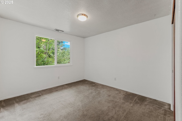 4720 NE 124th Ct, Vancouver, WA 98682 - carpeted empty room featuring a textured ceiling and baseboards