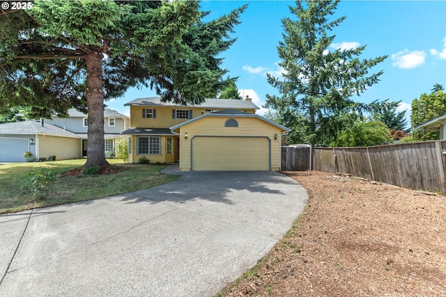 4720 NE 124th Ct, Vancouver, WA 98682 - traditional home featuring asphalt driveway, an attached garage, and a chimney