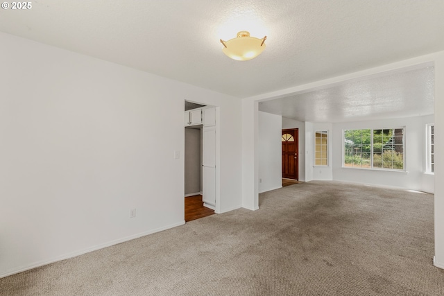 4720 NE 124th Ct, Vancouver, WA 98682 - unfurnished living room featuring carpet and baseboards