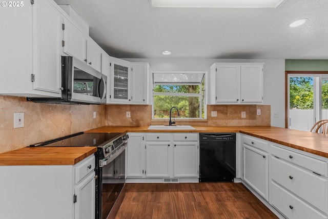 4720 NE 124th Ct, Vancouver, WA 98682 - kitchen featuring stainless steel appliances, dark wood-style flooring, plenty of natural light, white cabinetry, and recessed lighting