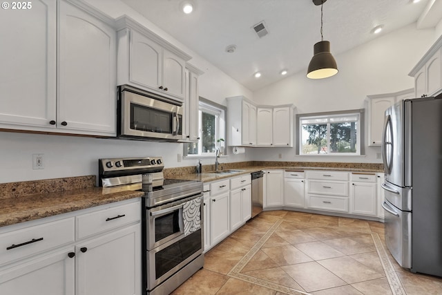 kitchen featuring appliances with stainless steel finishes, plenty of natural light, visible vents, and recessed lighting