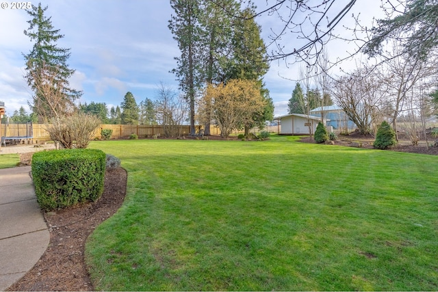 view of yard with fence